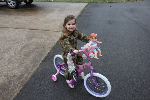 Ammon, new bicycle, and coveralls Christmas Day 2012