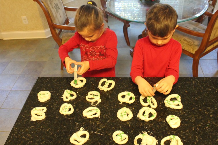 With Daddy H's syringe creation, making green stripes on the Pretzels