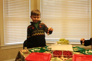 Carter proudly displays a kabob 