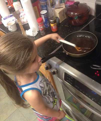 Ammon Stirs the General Tso sauce 